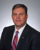 Representative Lance Reynolds (D)